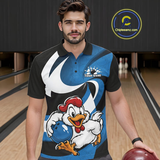 A man wearing a custom bowling-themed polo shirt with a blue, white, and black graphic design featuring a cartoon chicken and bowling pins, standing in a bowling alley.