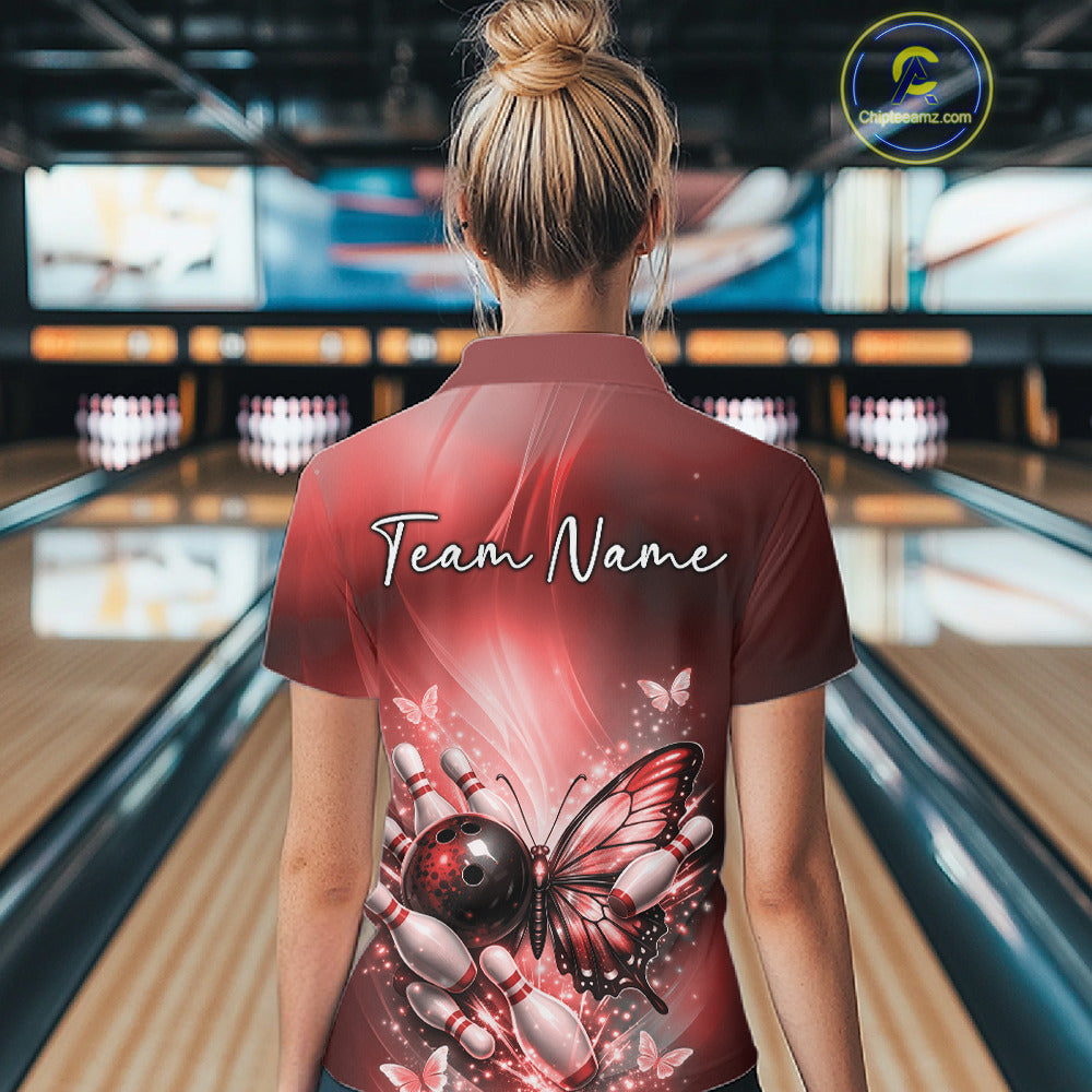 Back view of a female model in a bowling venue wearing a red quarter-zip bowling shirt featuring a butterfly and bowling-themed graphics.