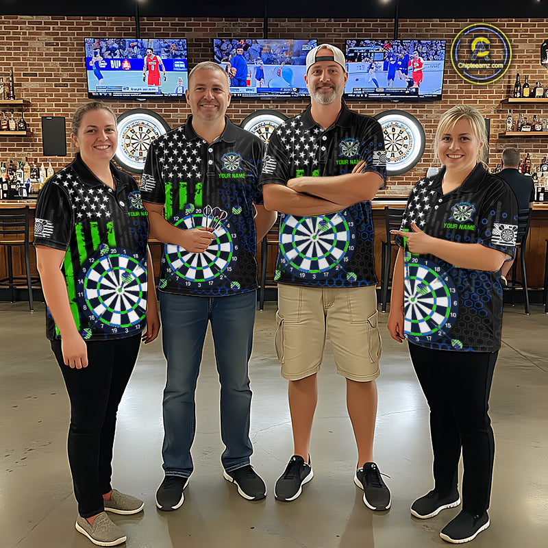 Group of four people in a sports bar wearing matching custom black darts team polo shirts featuring an green American flag and dartboard design.