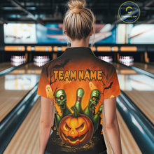 Load image into Gallery viewer, Person wearing a Halloween-themed shirt with 'TEAM NAME' at a bowling alley.