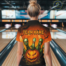 Load image into Gallery viewer, Person wearing a Halloween-themed shirt with 'TEAM NAME' text in a bowling alley.
