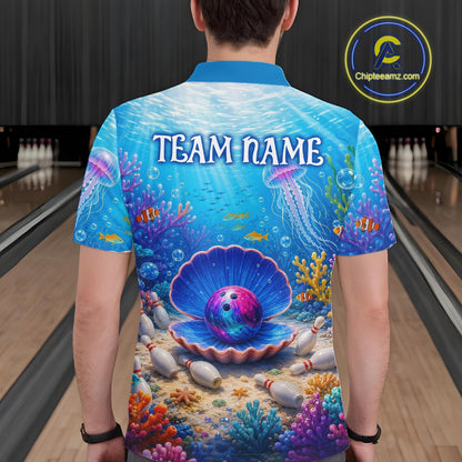 Person wearing a colorful bowling shirt with an underwater design and 'TEAM NAME' text on a bowling alley.