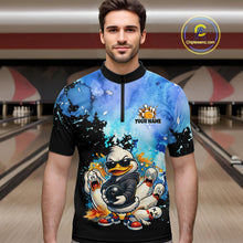 Load image into Gallery viewer, Man wearing a colorful t-shirt with cartoon characters in a bowling alley.