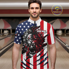 Load image into Gallery viewer, Man wearing a shirt with an American flag design and a lion graphic in a bowling alley.