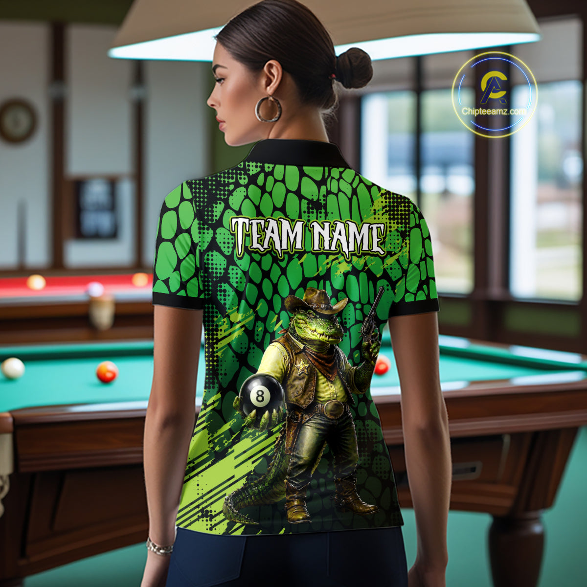 Person wearing a green and black patterned shirt with a graphic design in a pool hall.