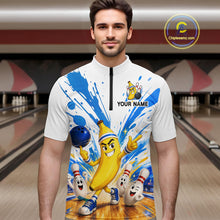Load image into Gallery viewer, Man wearing a colorful bowling-themed shirt with cartoon characters in a bowling alley.