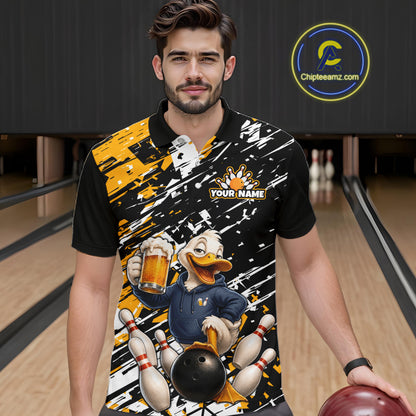 A man wearing a custom bowling polo shirt with a cartoon duck character holding a beer and bowling pins, set against a bowling alley background. The shirt features a black base with yellow and white paint splatter graphics and a customizable name patch.