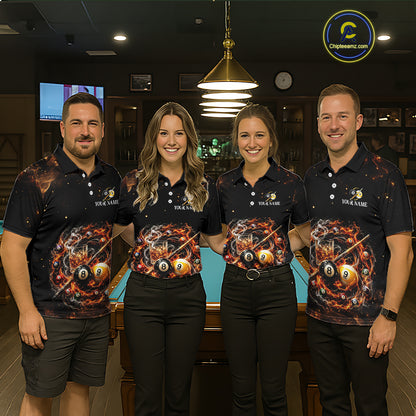 Four people wearing matching polo shirts with a pool ball design in a bar setting.