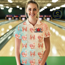 Load image into Gallery viewer, Woman wearing a colorful shirt with crab patterns in a bowling alley.