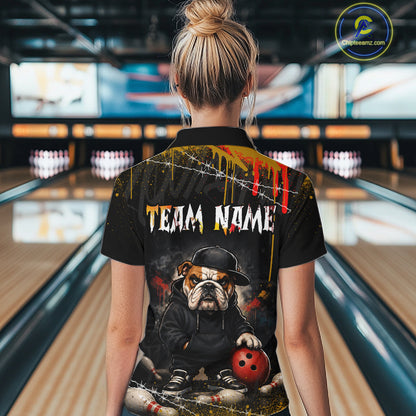 A man wearing custom black bulldog bowling polo shirt back view featuring a bowling ball, paint drip effect and grunge pattern, displaying Team Name, at the bowling alley