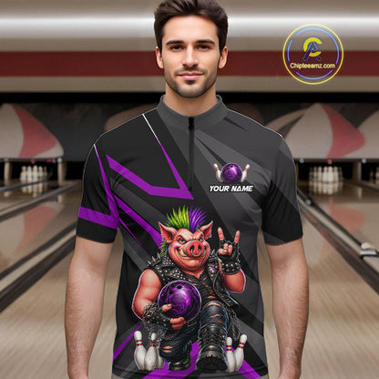 A man wearing a black short-sleeve bowling jersey with a large graphic of a pig bowling ball player and purple accents, standing in front of a blurred bowling alley background. 