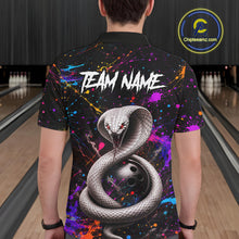 Load image into Gallery viewer, Person wearing a colorful bowling shirt with a snake design in a bowling alley.