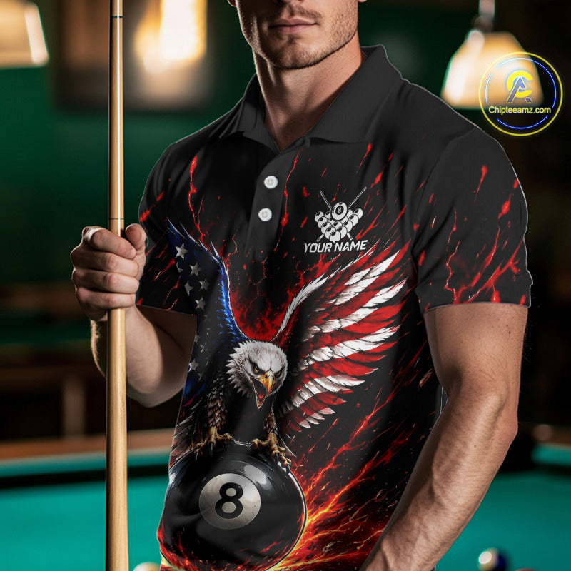 Man holding a pool cue wearing a black polo shirt with an eagle and number 8 design.