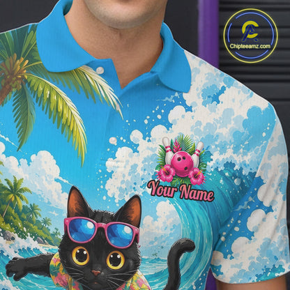 A close-up of a person wearing a short-sleeve polo shirt with a vibrant tropical beach print. The shirt features a bright blue collar and a blue ocean wave background with white clouds, palm trees, a black cat wearing pink sunglasses, and a pink flamingo graphic with the text 'Your Name'.