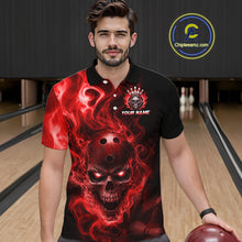 Load image into Gallery viewer, Man wearing a black bowling polo shirt featuring a flaming skull with glowing red eyes, red smoke effects, and custom “YOUR NAME” text.