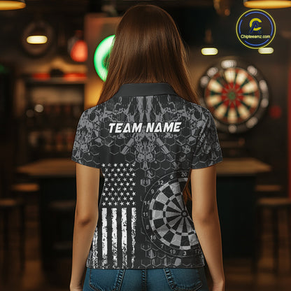 Women wearing darts polo shirt featuring dartboard graphics blended with a american flag flag pattern on a black gray background.