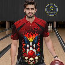 Load image into Gallery viewer, Man wearing a red and black bowling polo shirt featuring flaming bowling pins, a red bowling ball, a blue butterfly, roses, skulls, and custom player name text.
