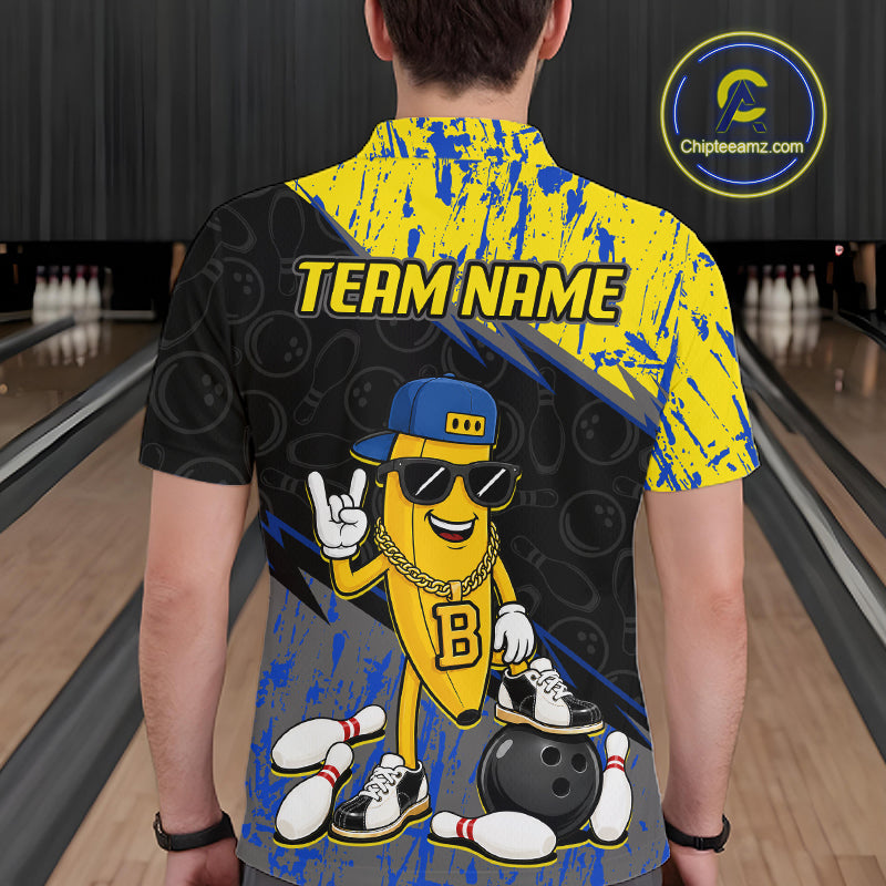 Man wearing a bowling shirt with a cartoon character and 'Team Name' text in a bowling alley.
