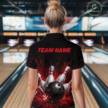 Load image into Gallery viewer, Woman wearing a black bowling quarter zip shirt with dramatic red splatter graphics, a large black bowling ball, and flying pins, plus custom team name text.