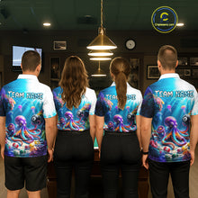Load image into Gallery viewer, Four people wearing matching colorful shirts with an octopus design in a room.