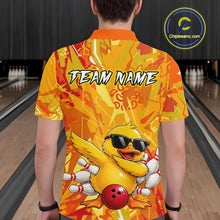 Load image into Gallery viewer, Person wearing a colorful bowling shirt with a duck graphic and 'Team Name' text in a bowling alley.