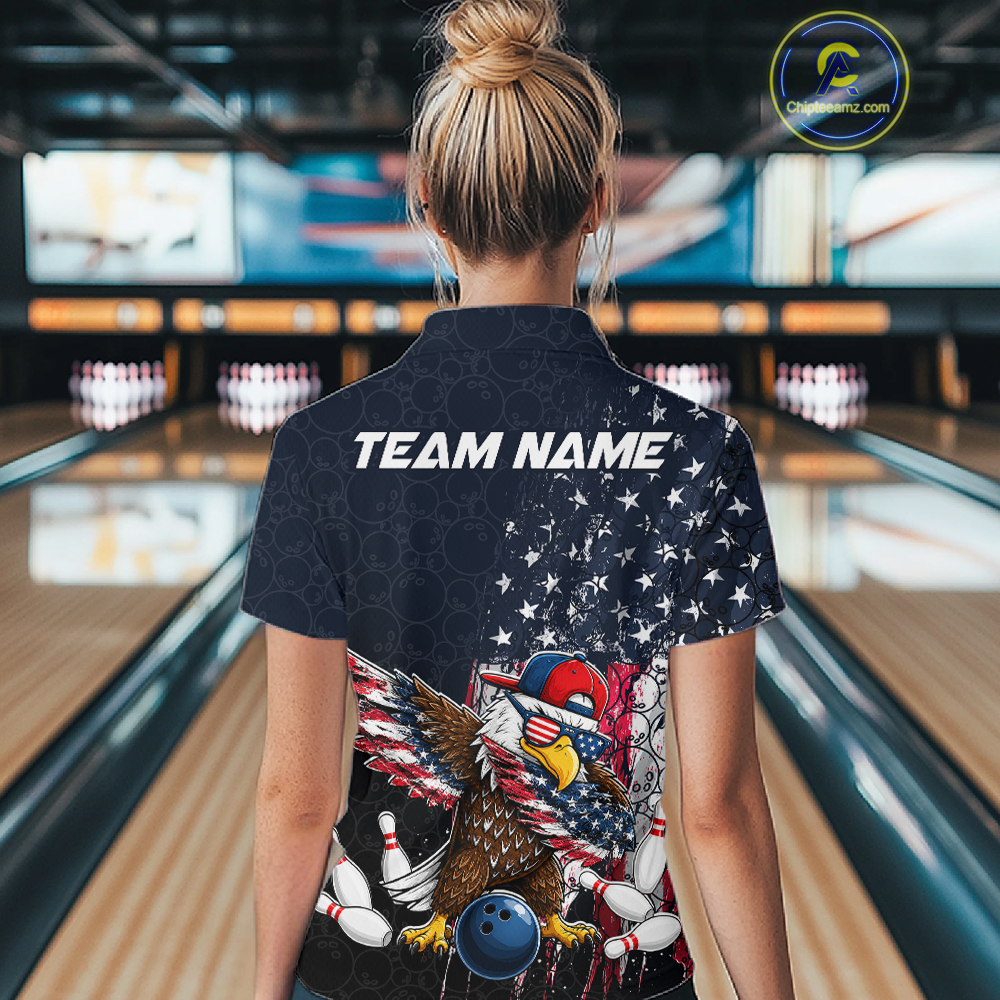 Woman wearing a dark patriotic bowling polo with distressed stars-and-stripes graphics, a eagle , bowling pins, and custom team name text.