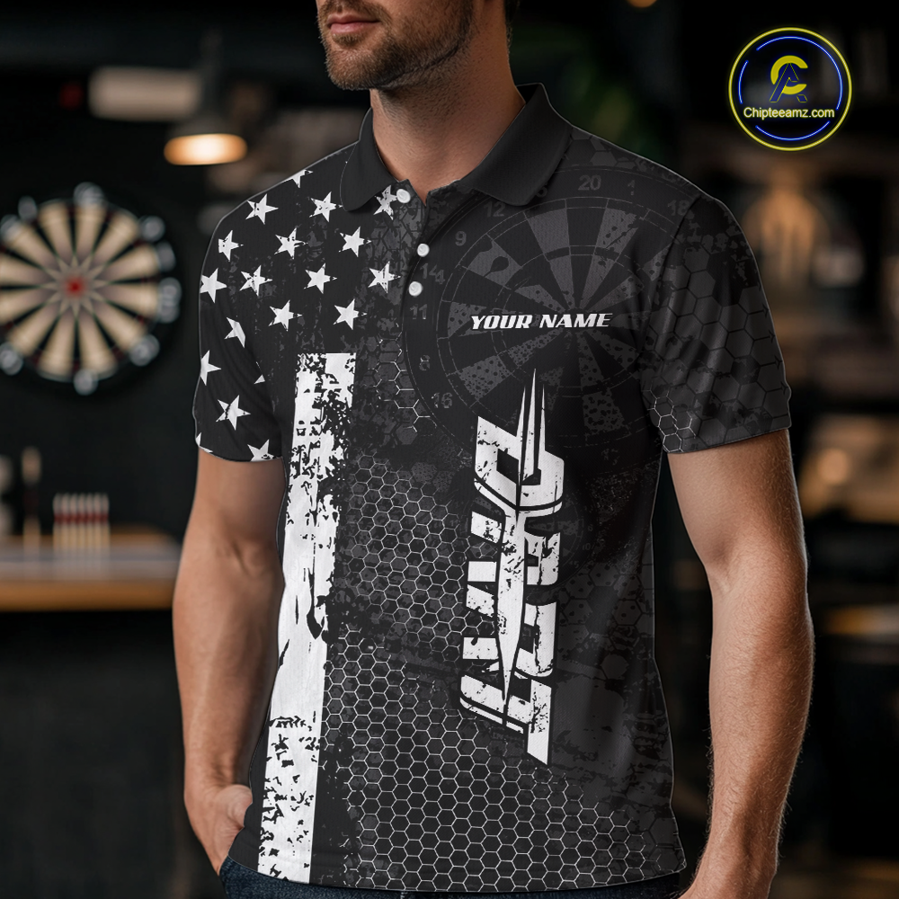 Man wearing darts polo shirt featuring dartboard patterns layered with american flag graphics and geometric details on a black background.
