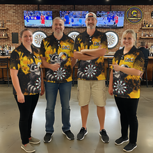 Load image into Gallery viewer, Four people wearing black and yellow darts polo featuring a raccoon drinking beer, dartboard graphics, and custom team and player name text.