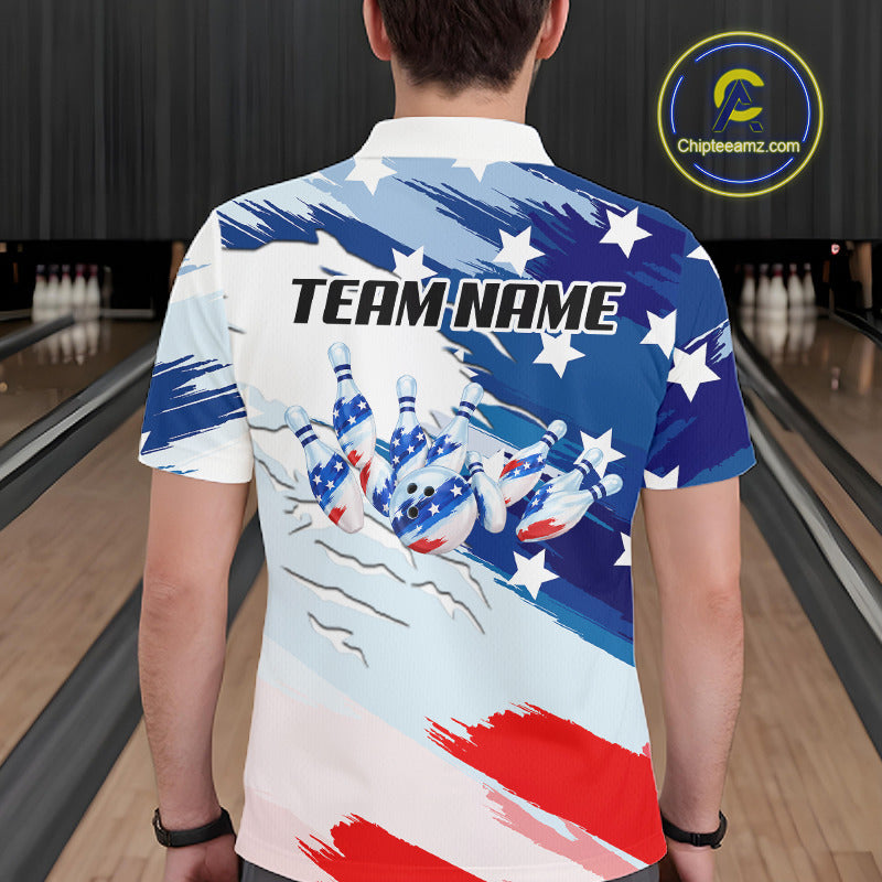 A man viewed from behind wearing a short-sleeve polo shirt with a patriotic bowling-themed graphic. The shirt features a white base with blue and red brushstroke patterns, white stars, bowling pins, and the text 'TEAM NAME' across the upper back.
