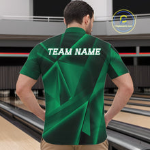Load image into Gallery viewer, Person wearing a green bowling shirt with 'TEAM NAME' text at a bowling alley.