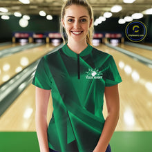 Load image into Gallery viewer, Person wearing a green bowling shirt with a logo and text in a bowling alley.