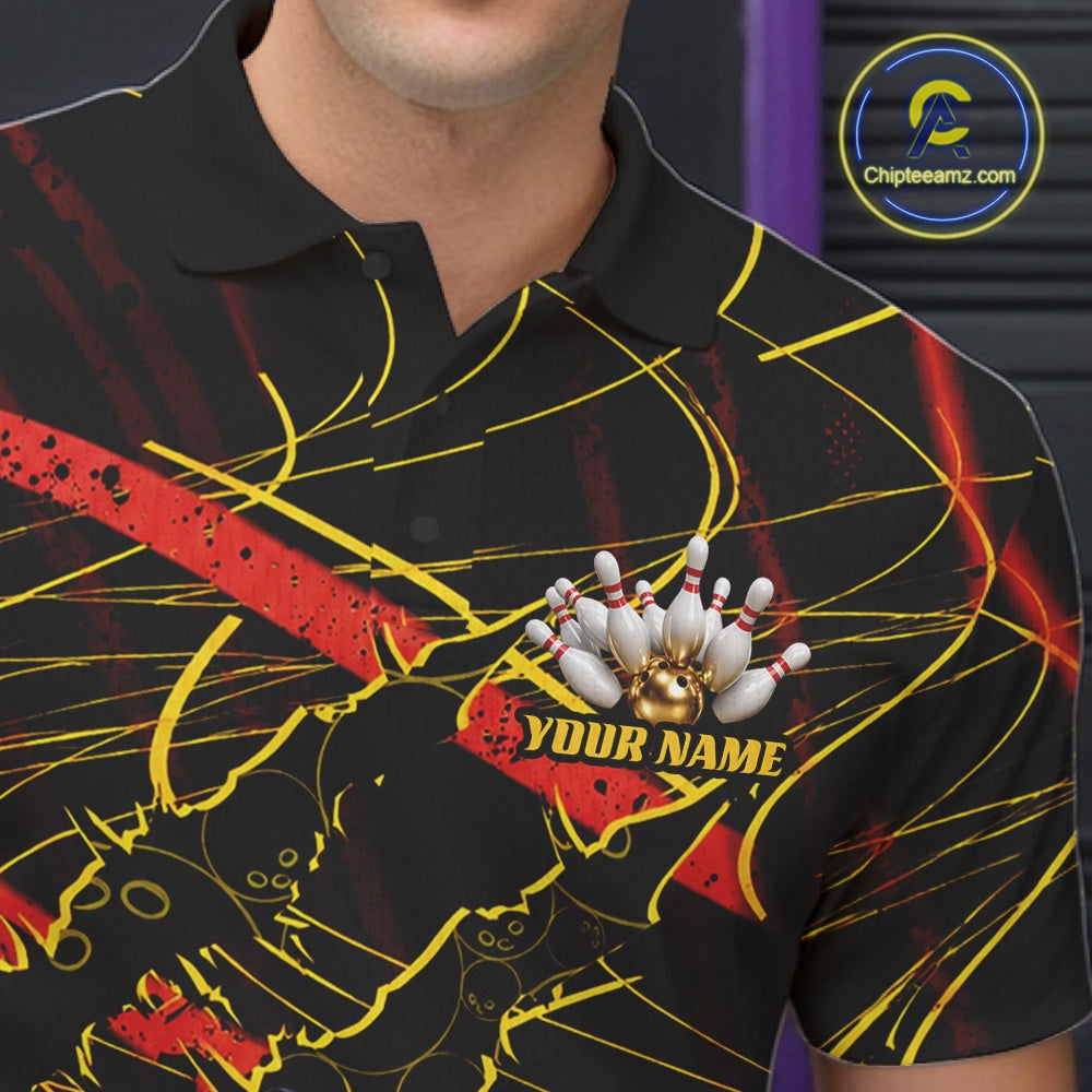 A close-up of a black short-sleeve polo shirt worn by a model, featuring a bowling-themed graphic with yellow lines, red splatters, and a bowling pins design with the text 'YOUR NAME'.