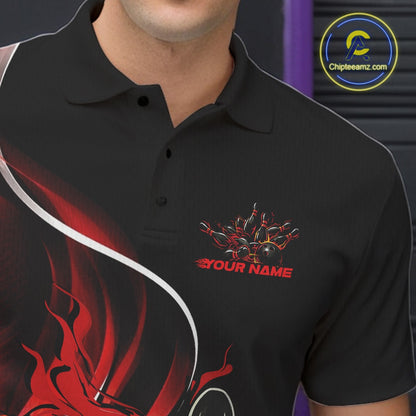 Close-up view of the left chest area of a black and red bowling polo shirt showing a flame bowling ball and pins design detail.