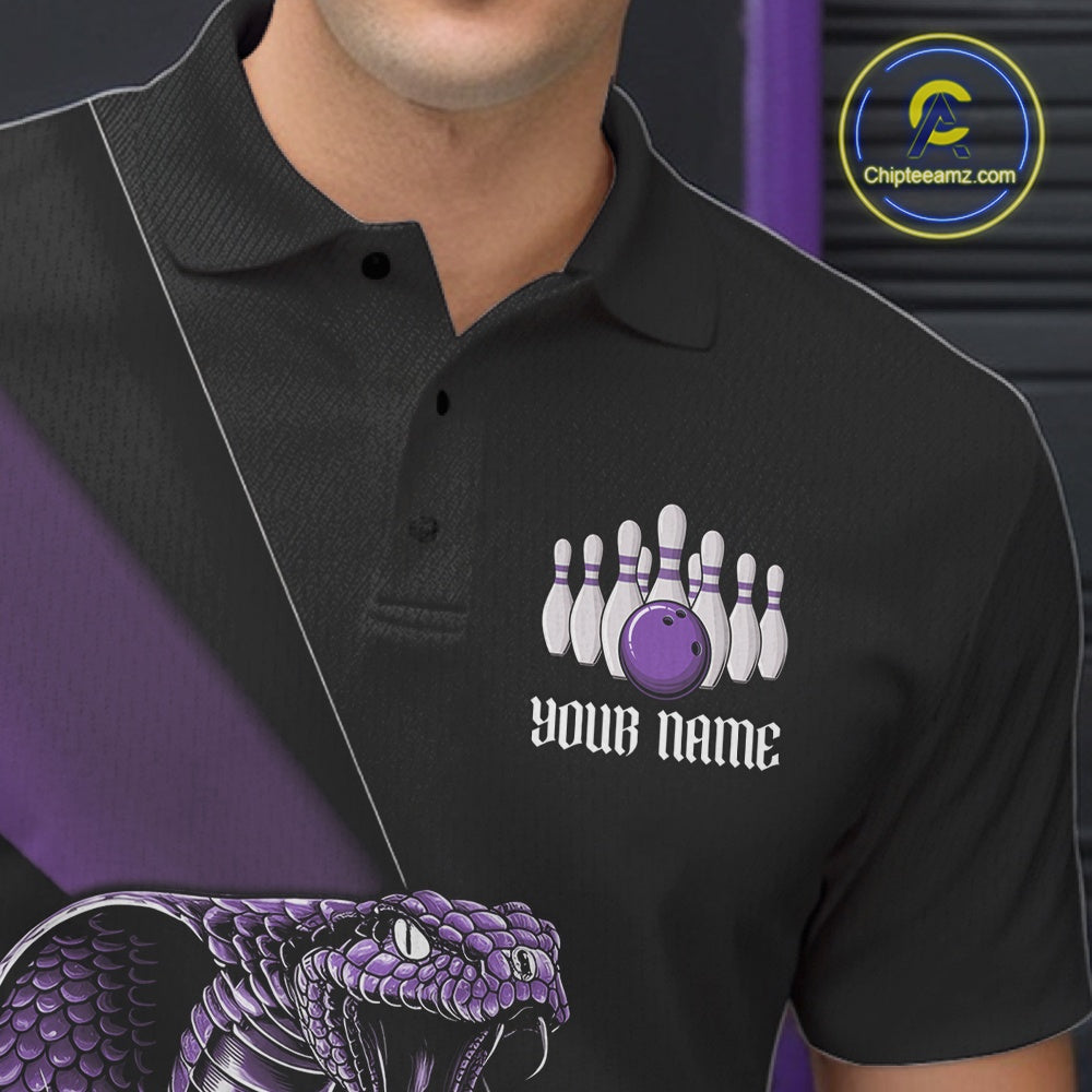 Close-up of the left chest on a black bowling polo featuring a purple cobra and bowling ball motif.