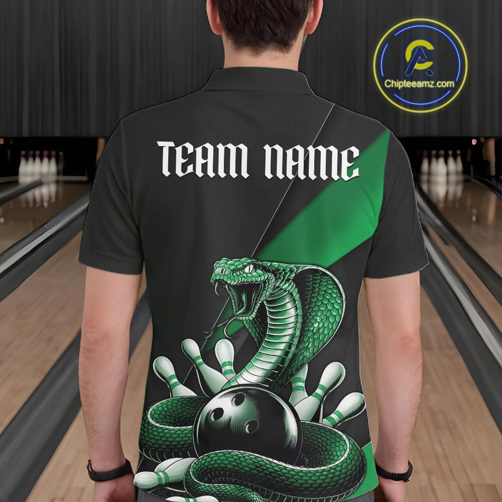 Back view of a black mens bowling polo displaying a green cobra wrapped around a bowling ball with scattered pins.