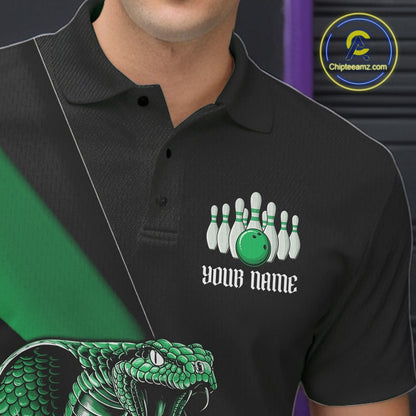 Left chest detail of a black bowling polo featuring a green cobra, bowling ball, and pin graphics.