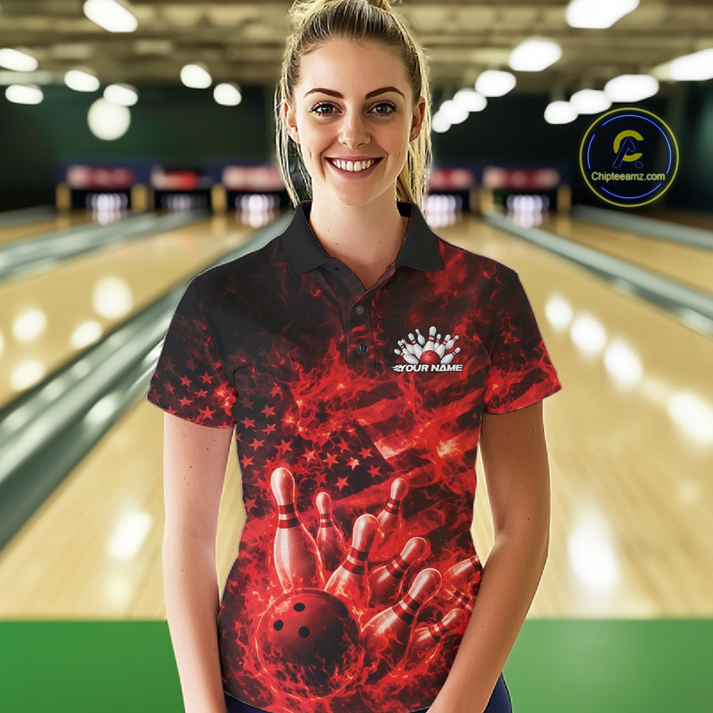 Female model wearing a black and red bowling polo at the bowling lane with fiery bowling action graphics.