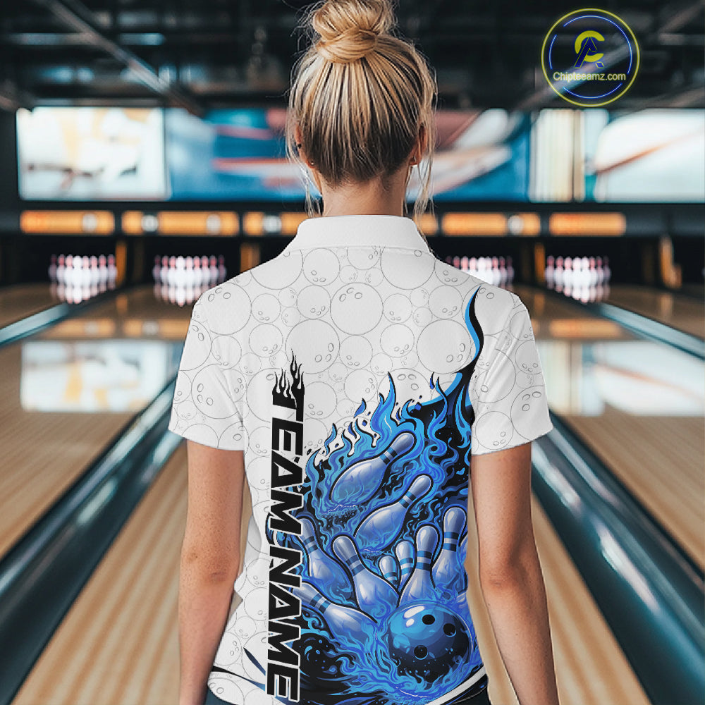 Back view female model in bowling lane wearing polo shirt with flaming bowling ball crashing into pins blue dynamic fire bowling design