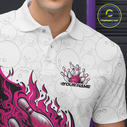 Close-up of the left chest on a white and pink bowling polo featuring a fiery bowling ball striking pins motif.