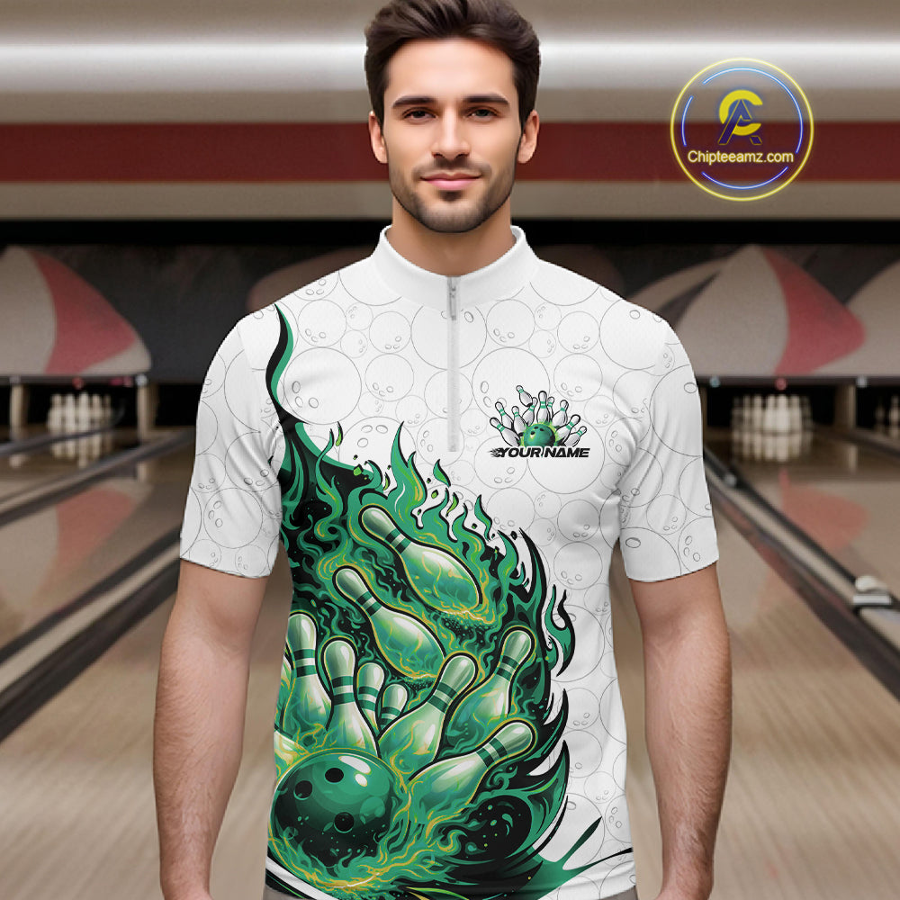 Male model in bowling lane wearing quarter-zip shirt with flaming bowling ball crashing pins white pink sports artwork