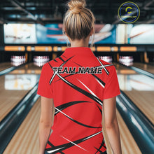 Load image into Gallery viewer, Back view of a female bowler wearing a red, black, and white bowling polo shirt in a bowling lane