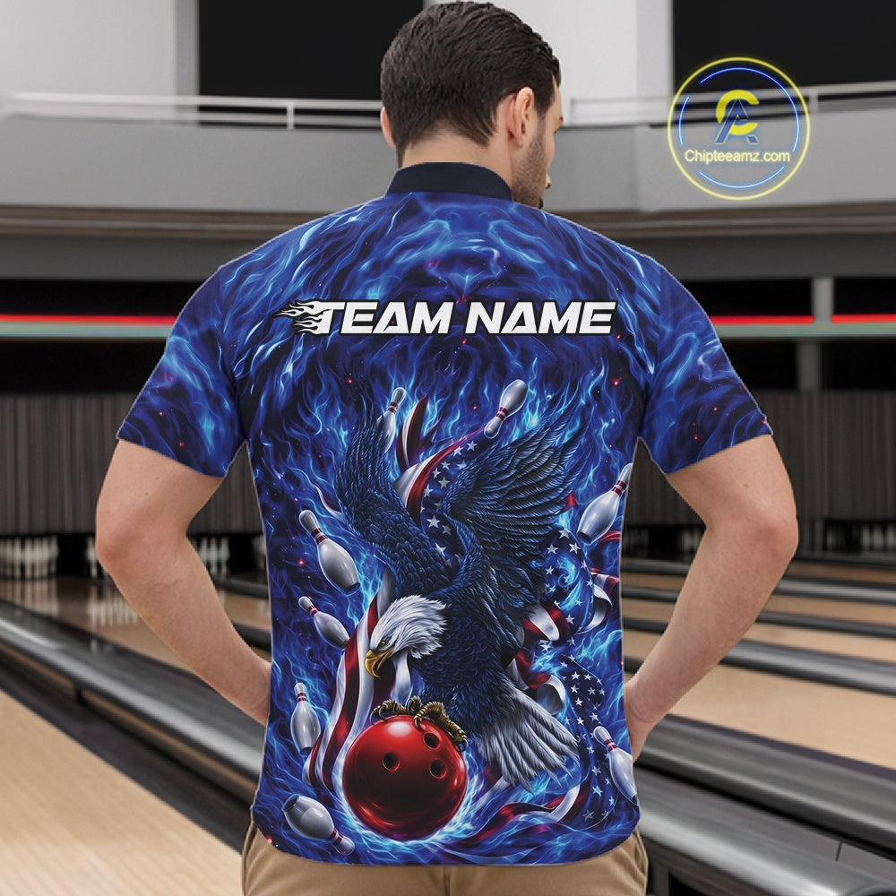 Male model front view in a bowling lane wearing a quarter zip shirt with eagle artwork, bowling ball, flowing flag elements, and pins.