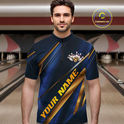 A man wearing a custom bowling shirt with a blue and gold graphic design, set against a blurred bowling alley background. The shirt features diagonal gold stripes, a bowling pin graphic, and the text 'YOUR NAME'.