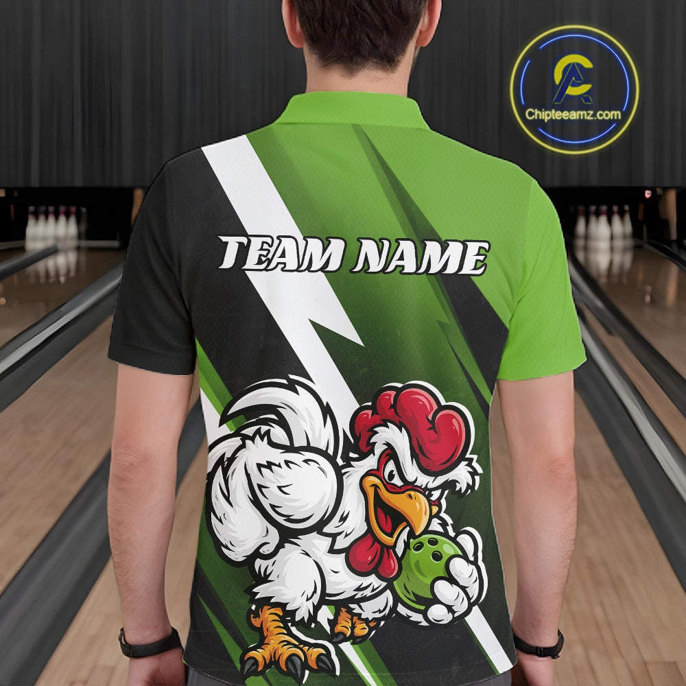 A person viewed from behind wearing a custom short-sleeve polo shirt in a bowling alley. The shirt features a green and black graphic design with a cartoon rooster holding a bowling ball and the text 'TEAM NAME' on the back.