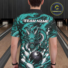 Load image into Gallery viewer, Person wearing a bowling-themed shirt with a dragon design in a bowling alley.