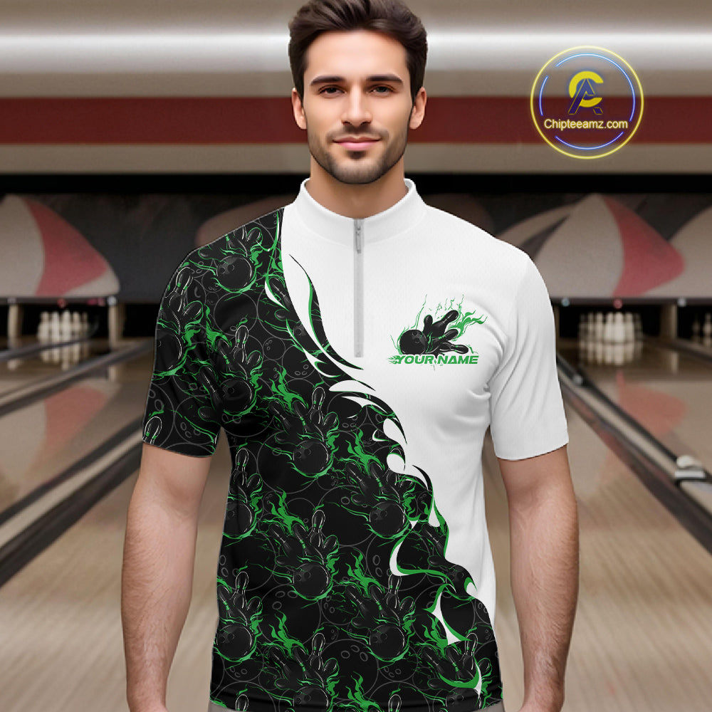 Male model in a bowling alley wearing white quarter zip shirt, front view showcasing green and black flame bowling pattern with dynamic bowling-themed artwork