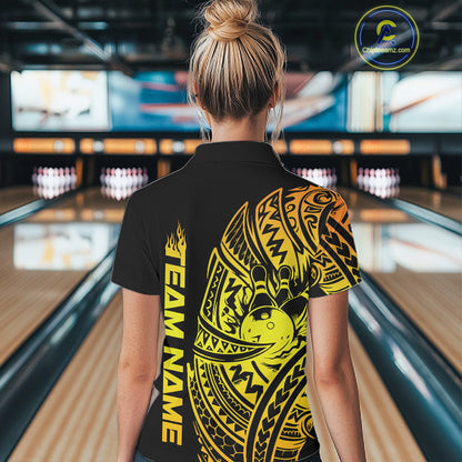 Back view of a female model in a black and gold bowling quarter-zip shirt featuring tribal swirl bowling motifs.