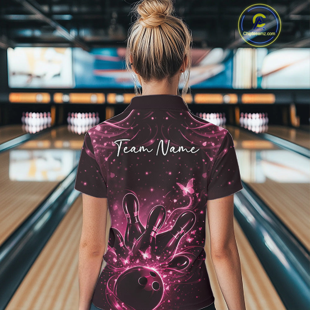 Back view of a female model wearing a black and pink bowling polo shirt with glowing butterfly accents.