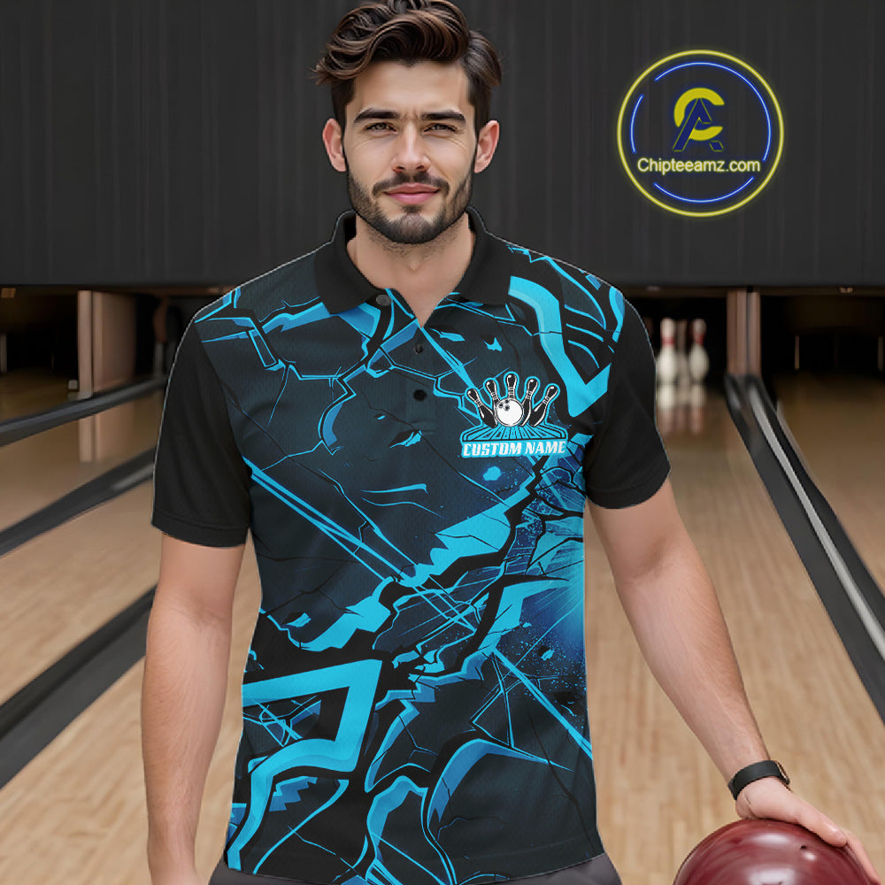 Male model in a bowling center wearing a bowling polo with black and blue angular geometric graphics.