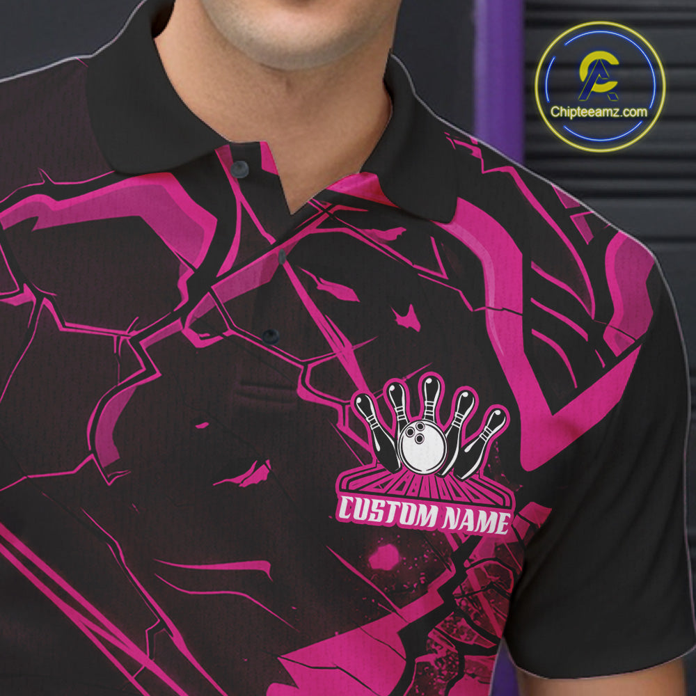 Close-up of the left chest on a bowling polo featuring black and pink angular cracked pattern details.